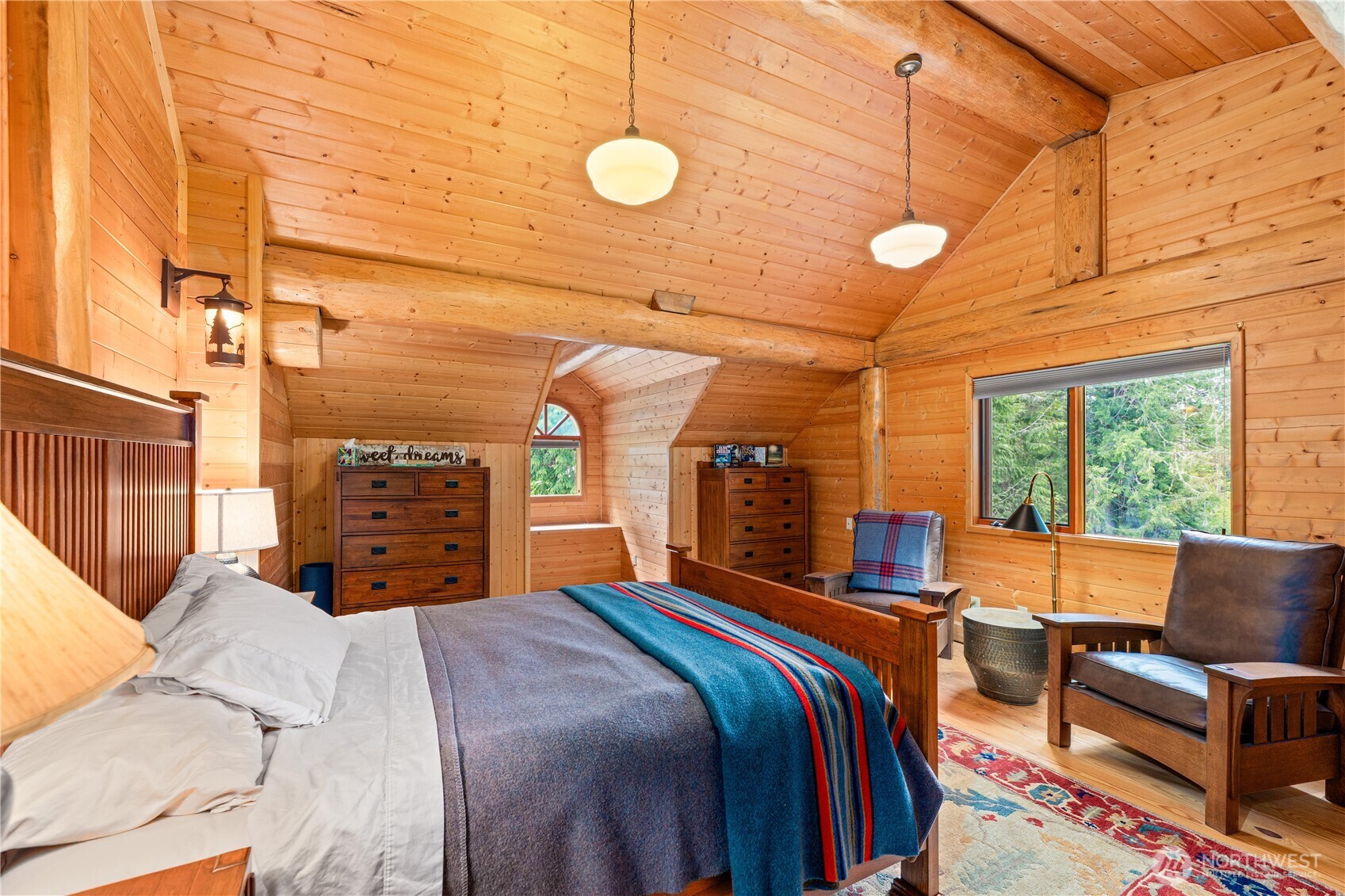 134 Sacred Moon Way Friday Harbor, WA 98250 - Photo 17 of 35 a bedroom with a bed and a large window