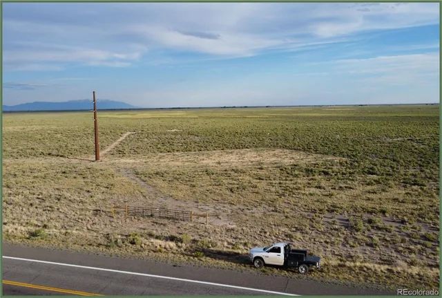 a view of a dry yard with wooden floor