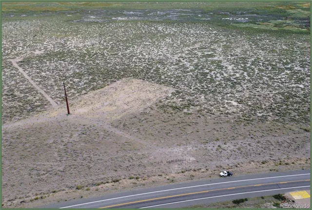 a view of a backyard with wooden floor