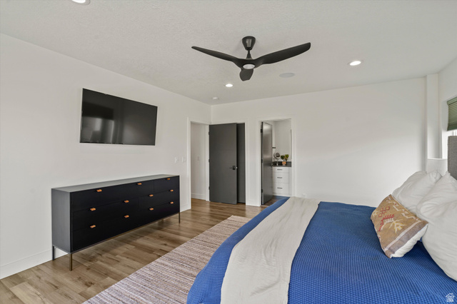 4499 North Seven Bridges Road, Unit 9 Eden, UT 84310 - Photo 43 of 65 Wood-finish flooring, recessed lighting, and a contemporary ceiling fan