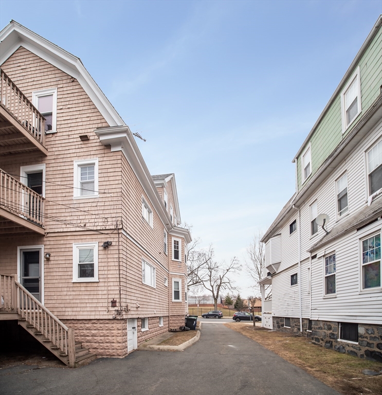 60 Powder House Boulevard, Unit 2 Somerville, MA 02144 - Photo 41 of 42 a view of a street with buildings