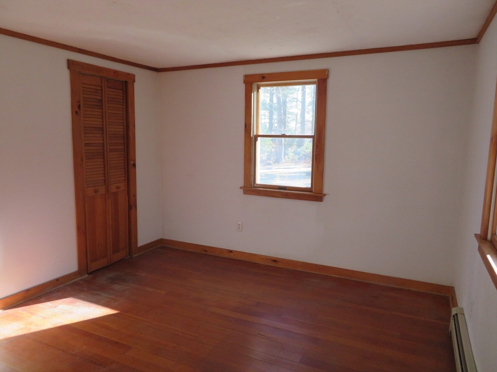 103 King Philip Road Norton, MA 02766 - Photo 17 of 37 an empty room with windows