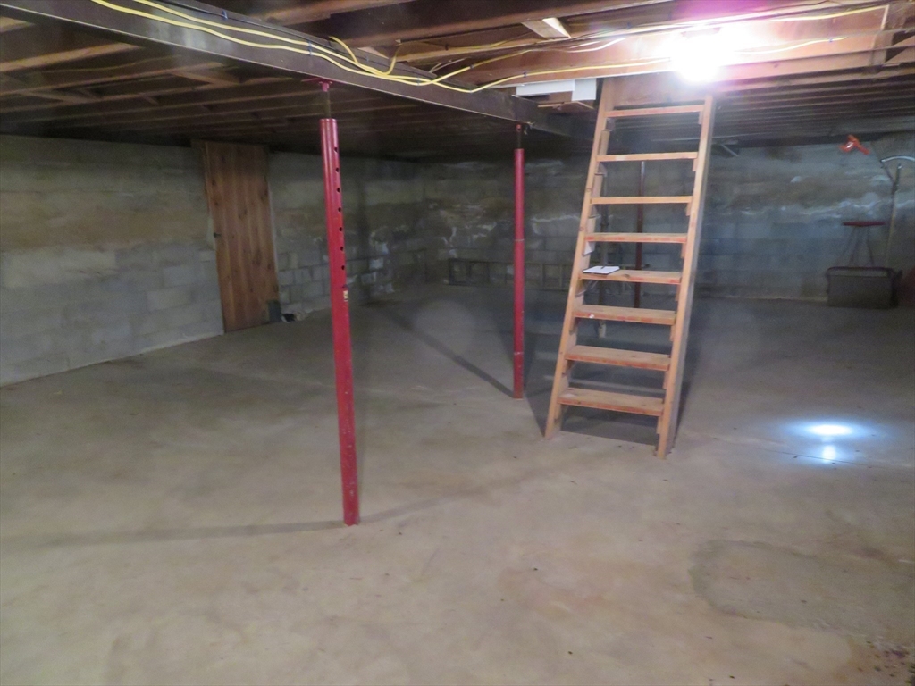 103 King Philip Road Norton, MA 02766 - Photo 23 of 37 a view of a room with a wooden roof and a window