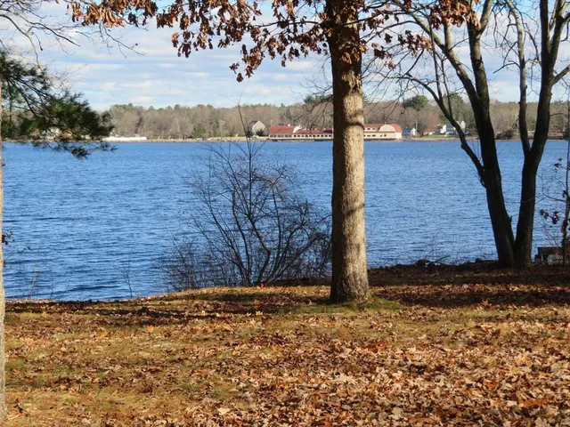a view of a backyard of the house