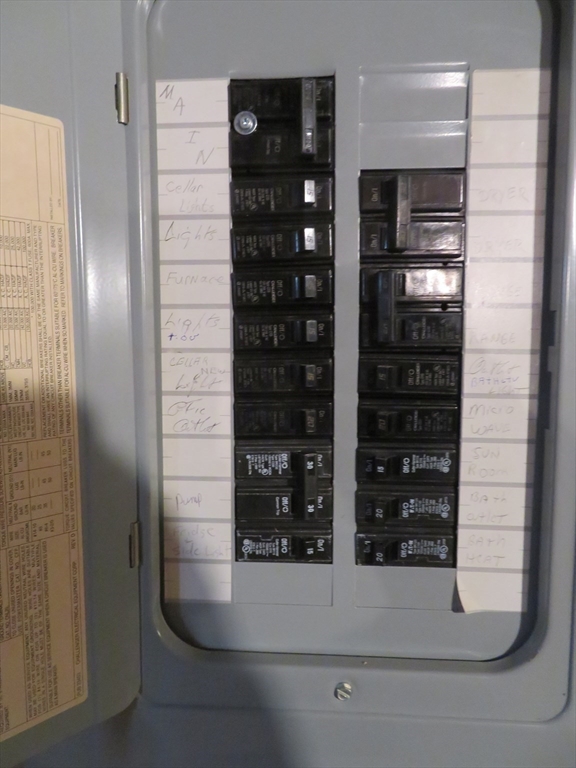 103 King Philip Road Norton, MA 02766 - Photo 32 of 37 a bathroom with a glass shower door