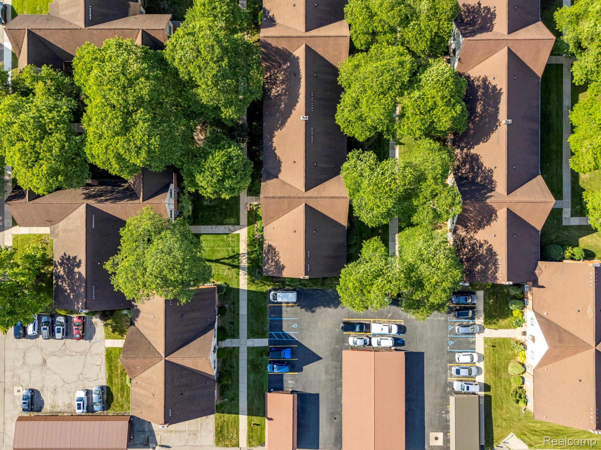 30220 Southfield Road Southfield, MI 48076 - Photo 13 of 13 Aerial perspective showcasing multiple residential buildings with brown shingle roofs