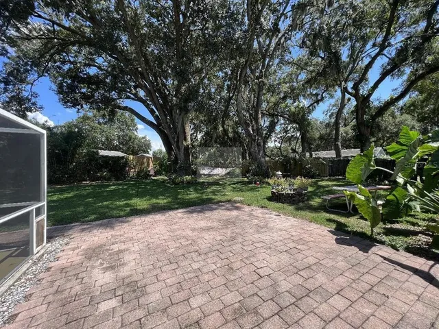 a front view of house with yard and seating area