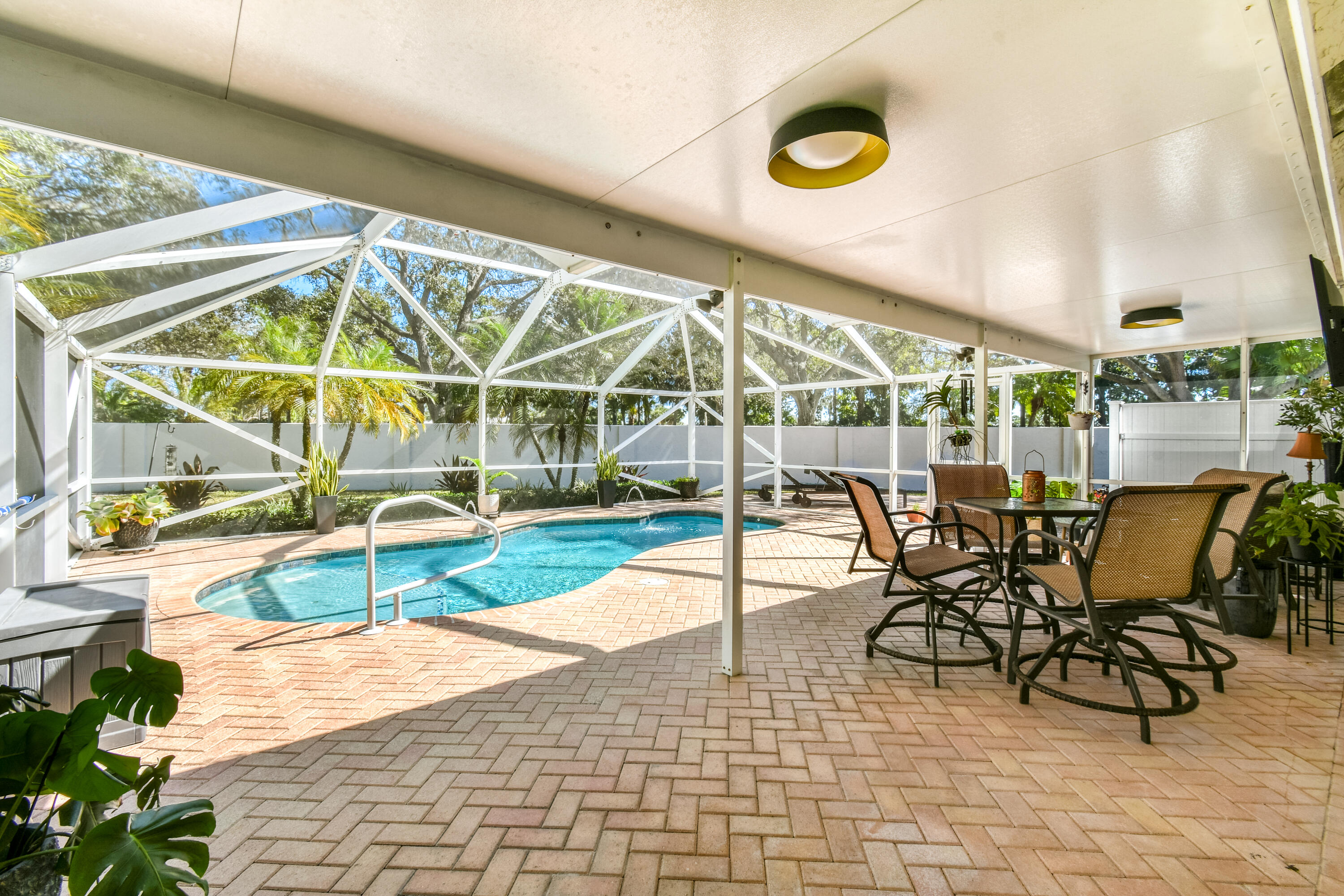 163 Spoonbill Court Jupiter, FL 33458 - Photo 44 of 67 Large Lanai and salt water pool