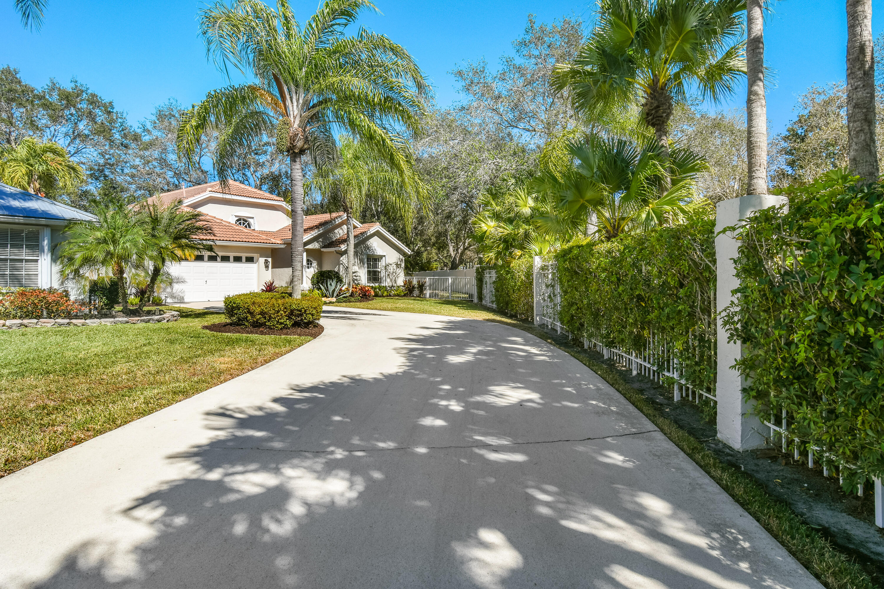 163 Spoonbill Court Jupiter, FL 33458 - Photo 6 of 67 Private driveway to end unit of cul-de-s