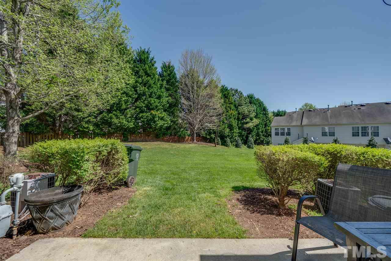 8460 Reedy Ridge Lane Raleigh, NC 27613 - Photo 22 of 22 a view of a garden with sitting area