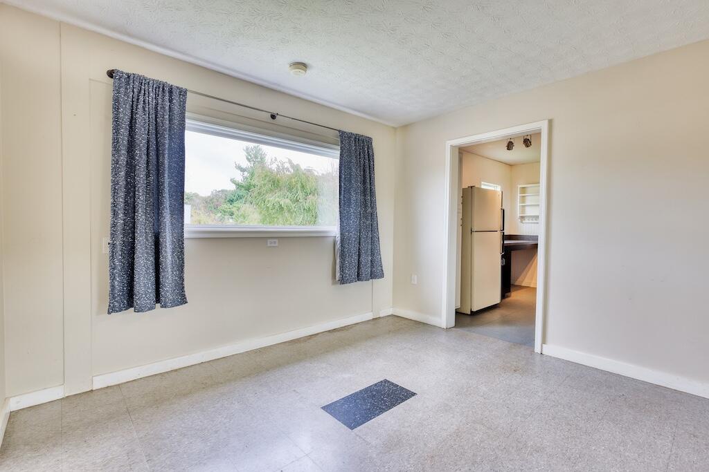1011 Wilson Cemetery Road Northeast Check, VA 24072 - Photo 22 of 41 an empty room with windows and closet