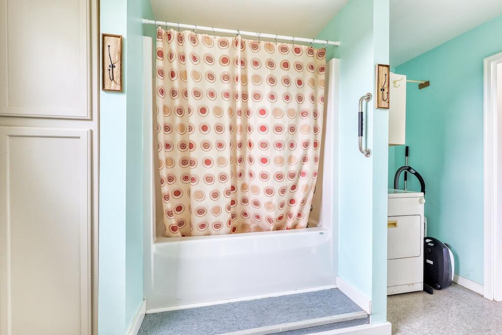 1011 Wilson Cemetery Road Northeast Check, VA 24072 - Photo 25 of 41 a bathroom with a bathtub and shower