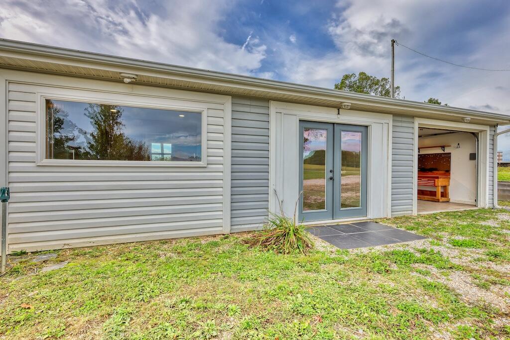 1011 Wilson Cemetery Road Northeast Check, VA 24072 - Photo 34 of 41 a front view of a house with a garden