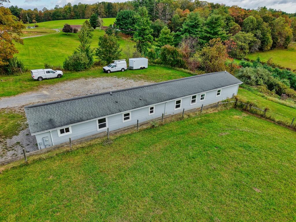1011 Wilson Cemetery Road Northeast Check, VA 24072 - Photo 37 of 41 an aerial view of a house with a yard and lake view