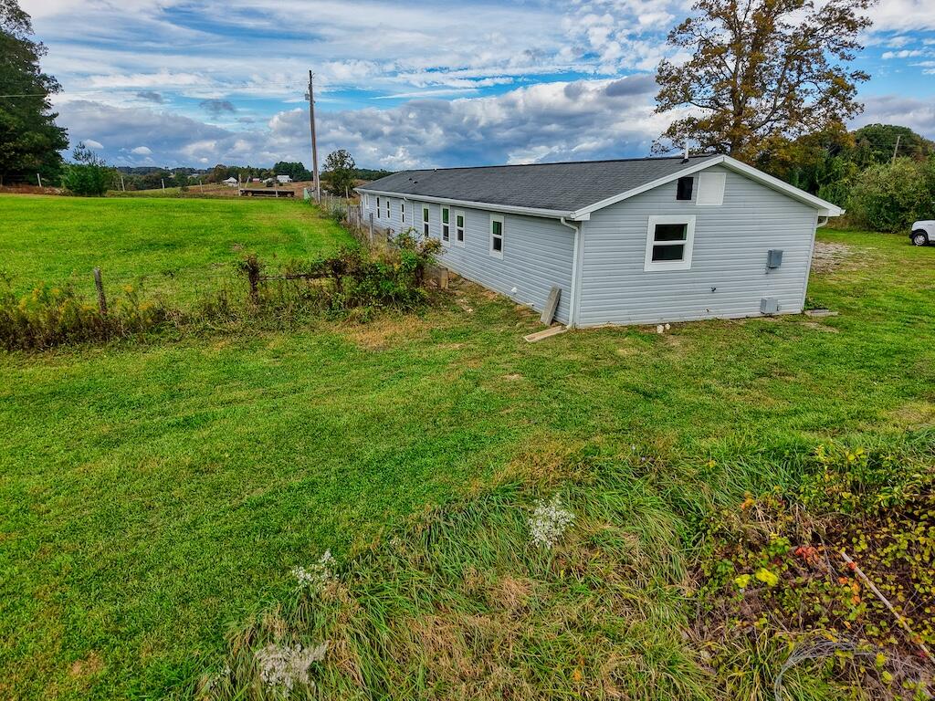 1011 Wilson Cemetery Road Northeast Check, VA 24072 - Photo 38 of 41 a view of a backyard with garden