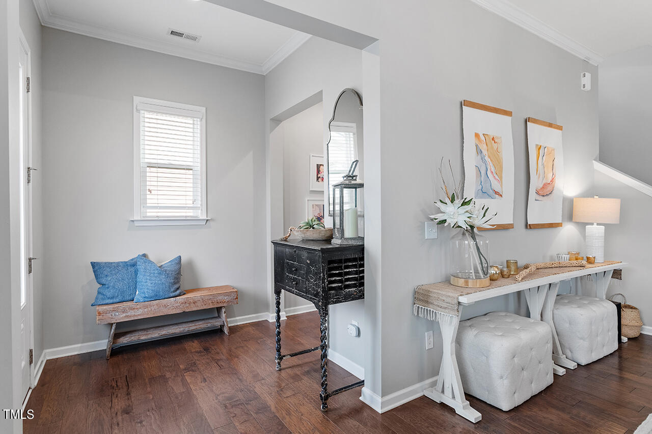 1616 Upper Park Road Wake Forest, NC 27587 - Photo 6 of 20 a living room with furniture and a wooden floor