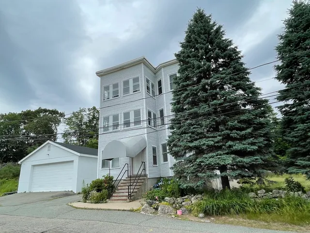 a view of a house with a door and chair