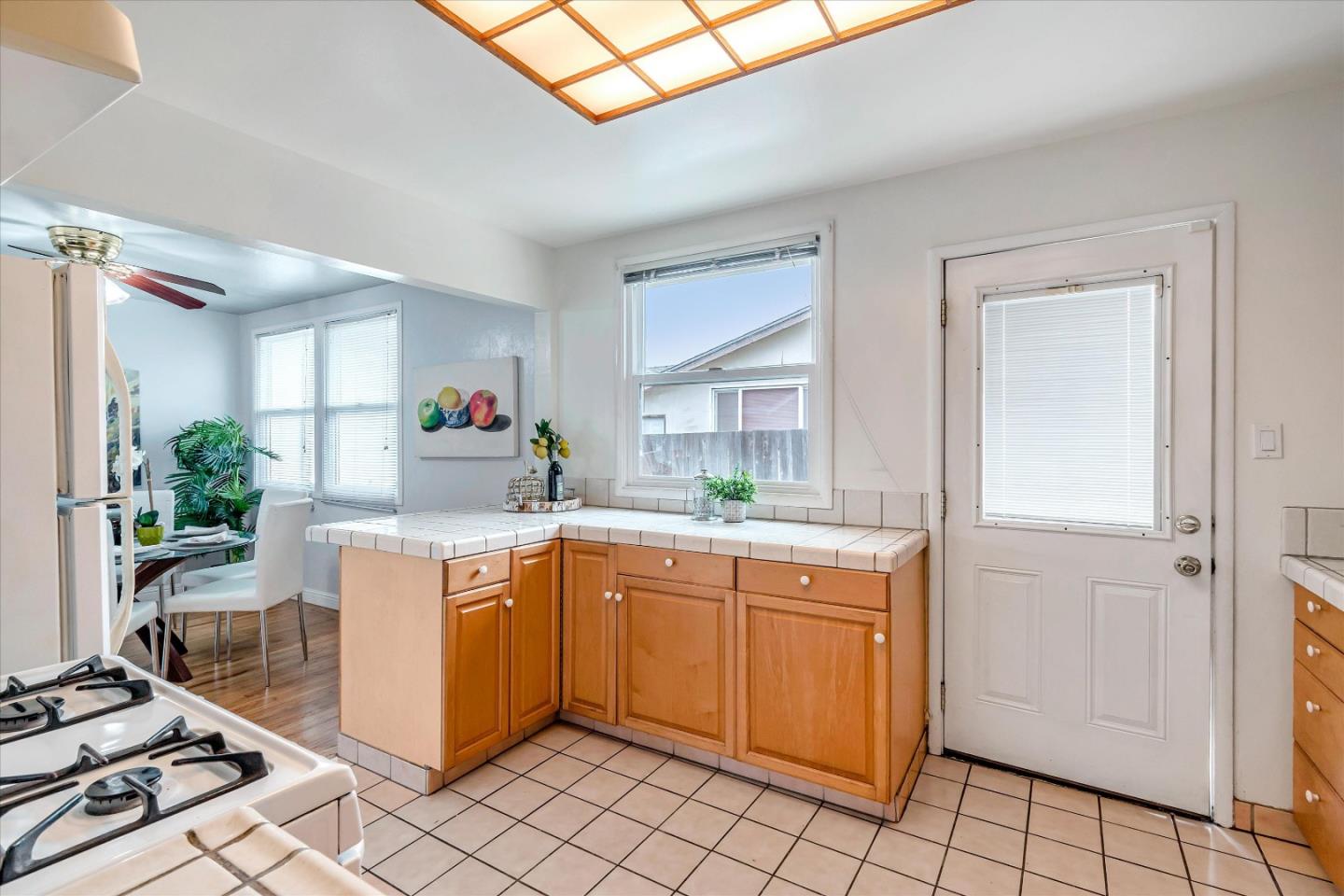 1159 De Solo Drive Pacifica, CA 94044 - Photo 14 of 45 a kitchen with a sink cabinets and window