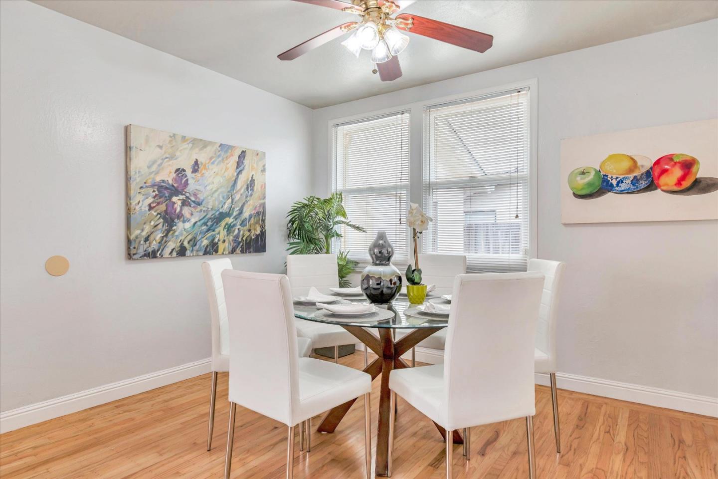 1159 De Solo Drive Pacifica, CA 94044 - Photo 25 of 45 a view of a dining room with furniture and a potted plant