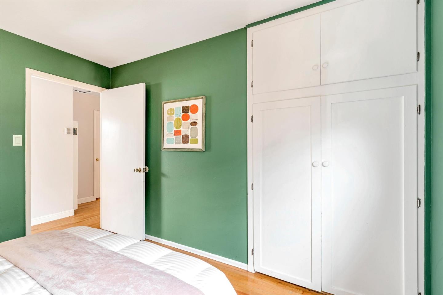 1159 De Solo Drive Pacifica, CA 94044 - Photo 28 of 45 a bedroom with a bed and a window