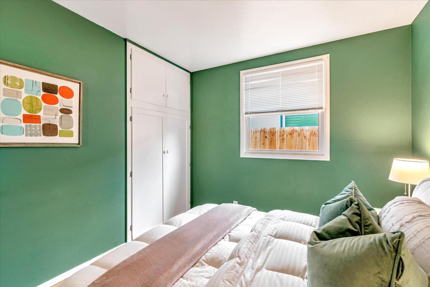 1159 De Solo Drive Pacifica, CA 94044 - Photo 29 of 45 a bedroom with a bed and a window