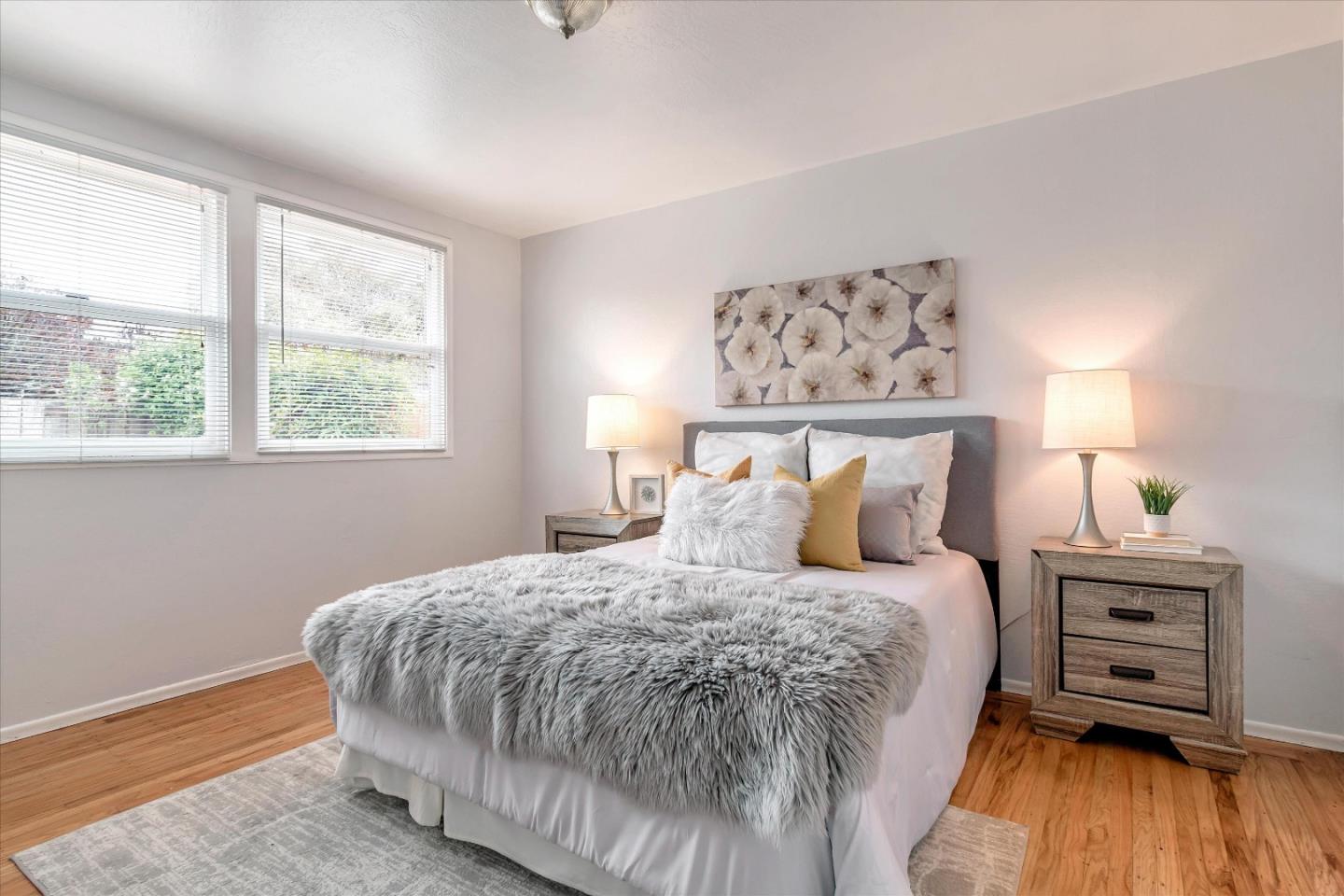 1159 De Solo Drive Pacifica, CA 94044 - Photo 30 of 45 a bedroom with a bed and a window