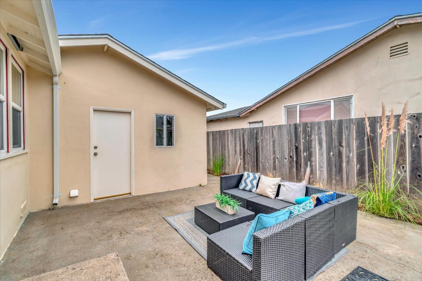 1159 De Solo Drive Pacifica, CA 94044 - Photo 39 of 45 a backyard of a house with table and chairs