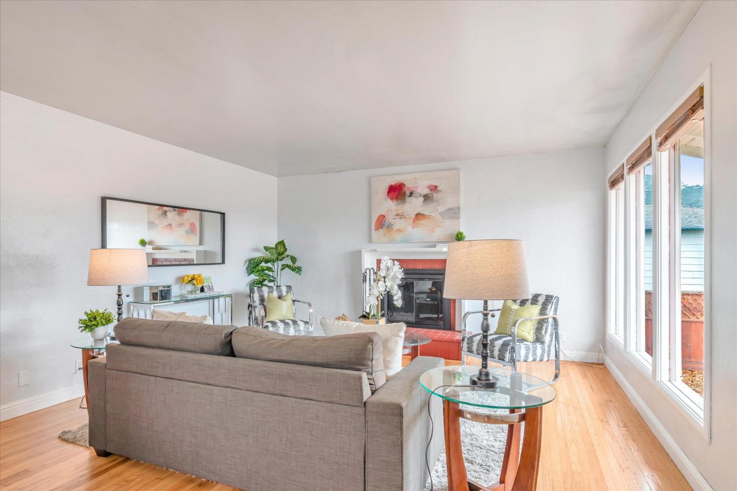 1159 De Solo Drive Pacifica, CA 94044 - Photo 8 of 45 a living room with furniture and a wooden floor