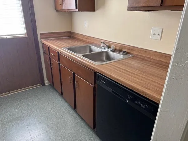 a utility room with sink