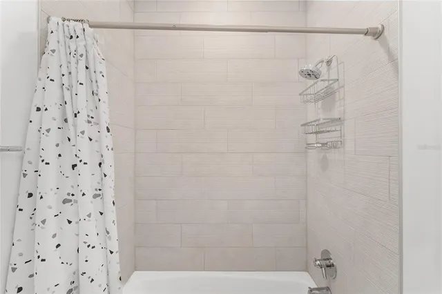 a view of empty room with stairs