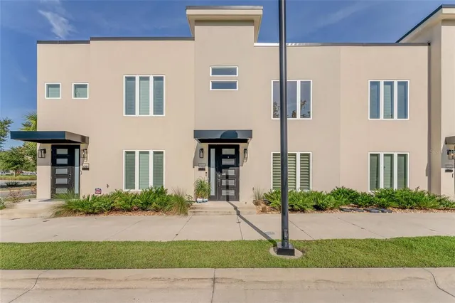 a view of a park with large trees
