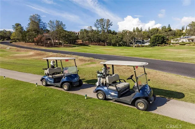 a view of a swimming pool and lounge chair