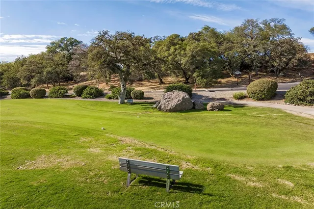 a view of a lake with a yard
