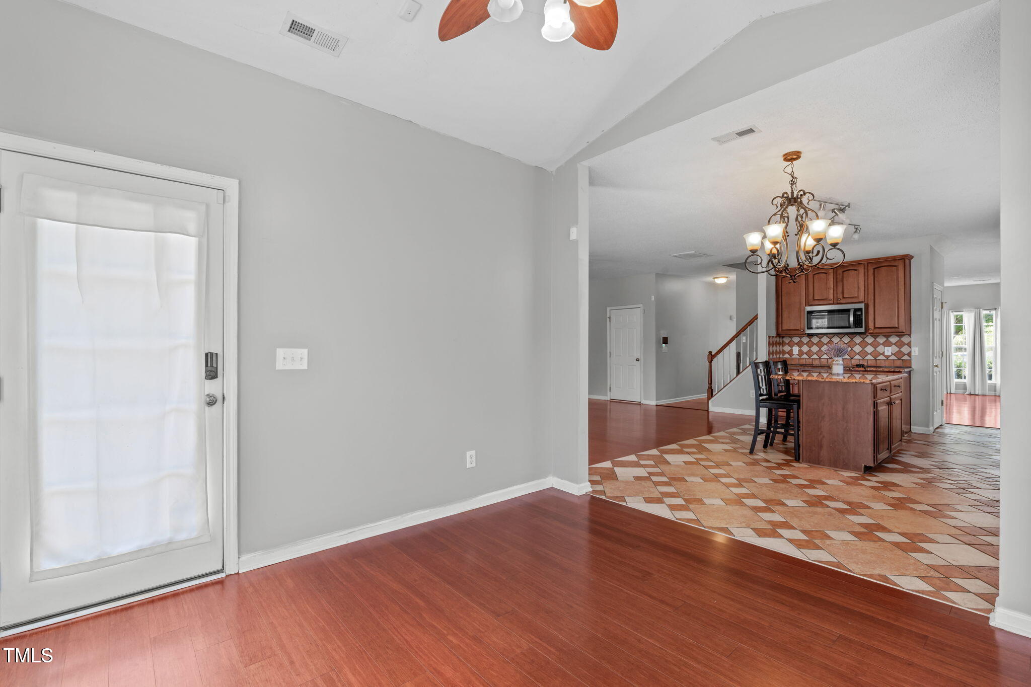 760 Stackhurst Way Wake Forest, NC 27587 - Photo 16 of 37 a view of a room with kitchen and dining table