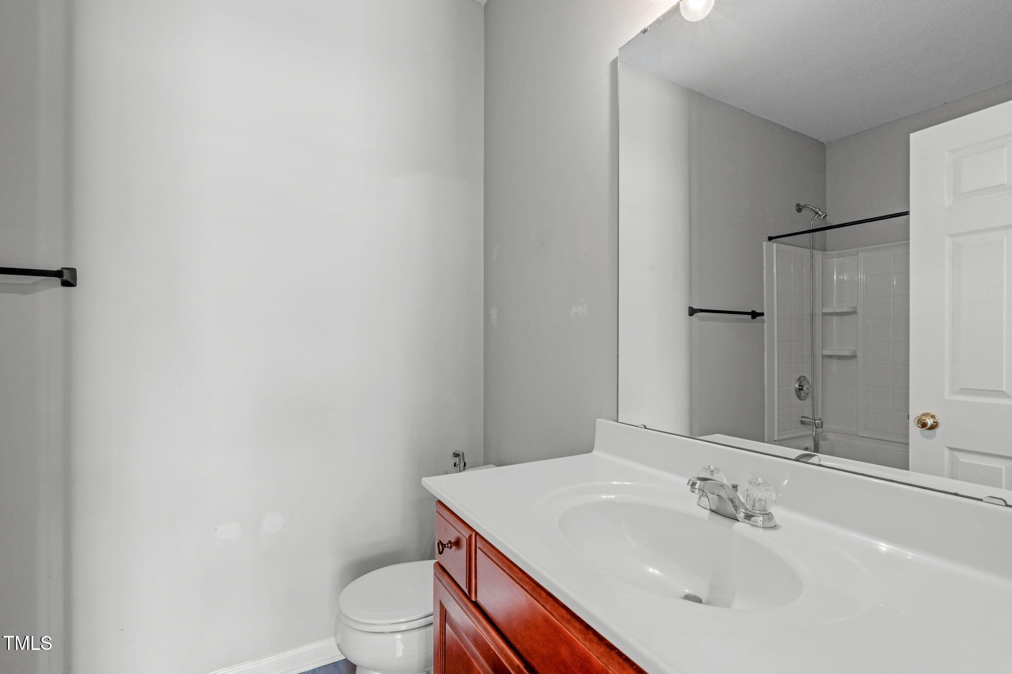 760 Stackhurst Way Wake Forest, NC 27587 - Photo 19 of 37 a bathroom with a sink toilet and vanity