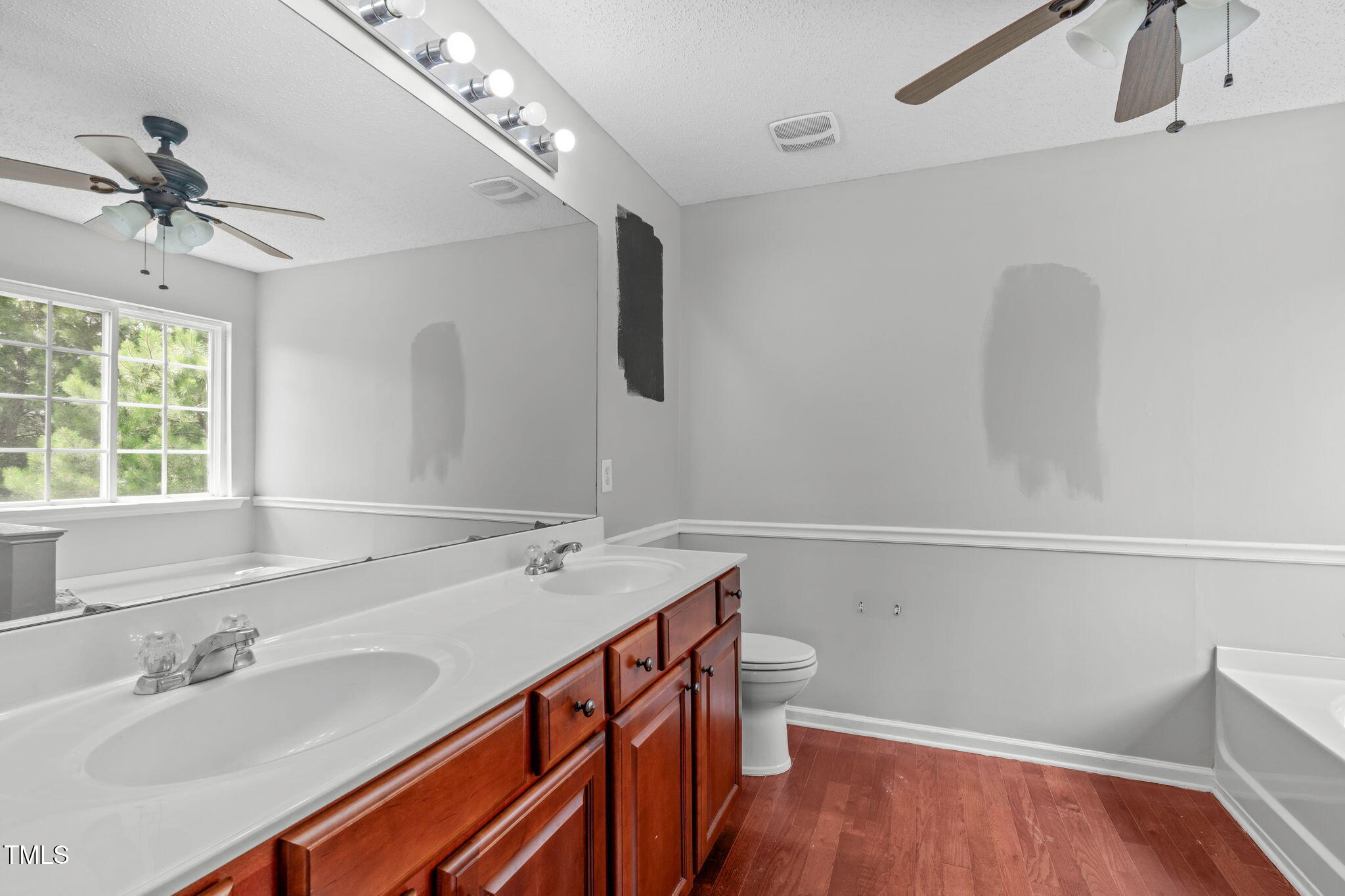 760 Stackhurst Way Wake Forest, NC 27587 - Photo 26 of 37 a bathroom with a sink and a mirror
