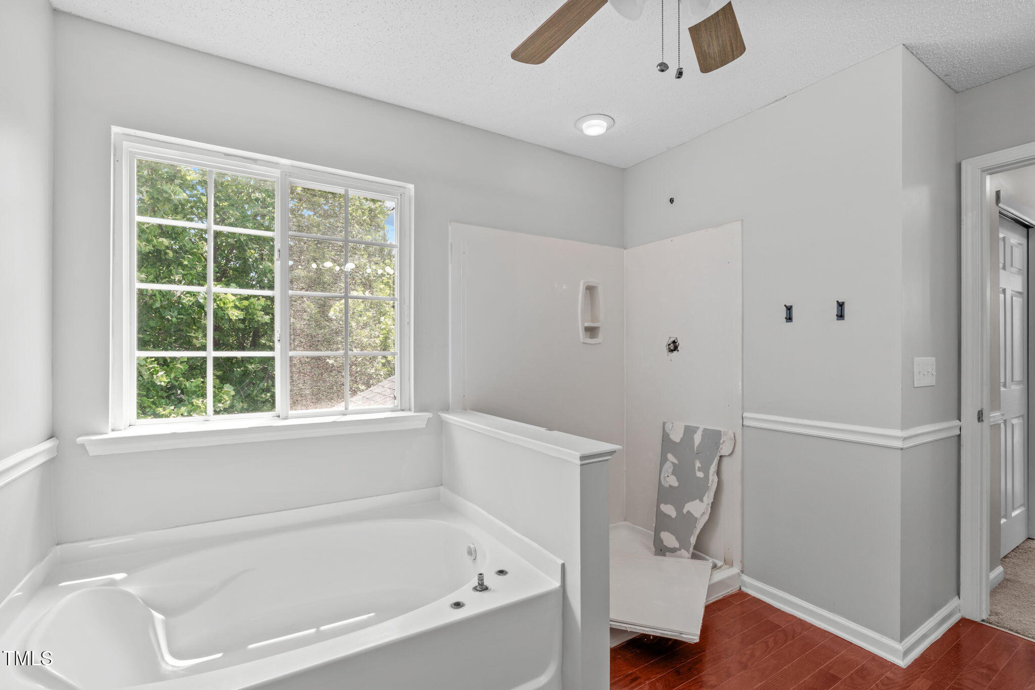 760 Stackhurst Way Wake Forest, NC 27587 - Photo 27 of 37 a white bath tub sitting next to a window