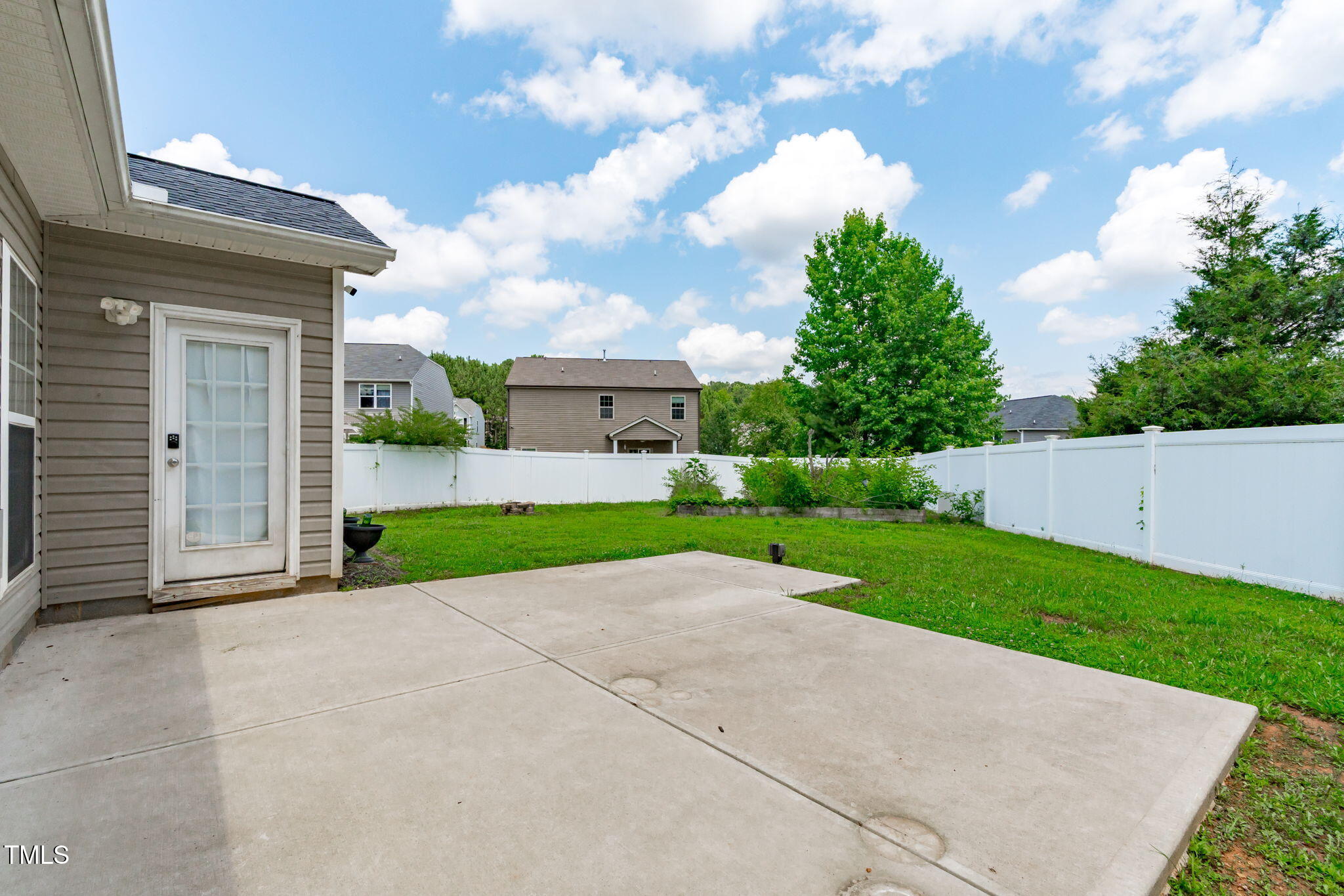 760 Stackhurst Way Wake Forest, NC 27587 - Photo 33 of 37 a view of a house with a yard