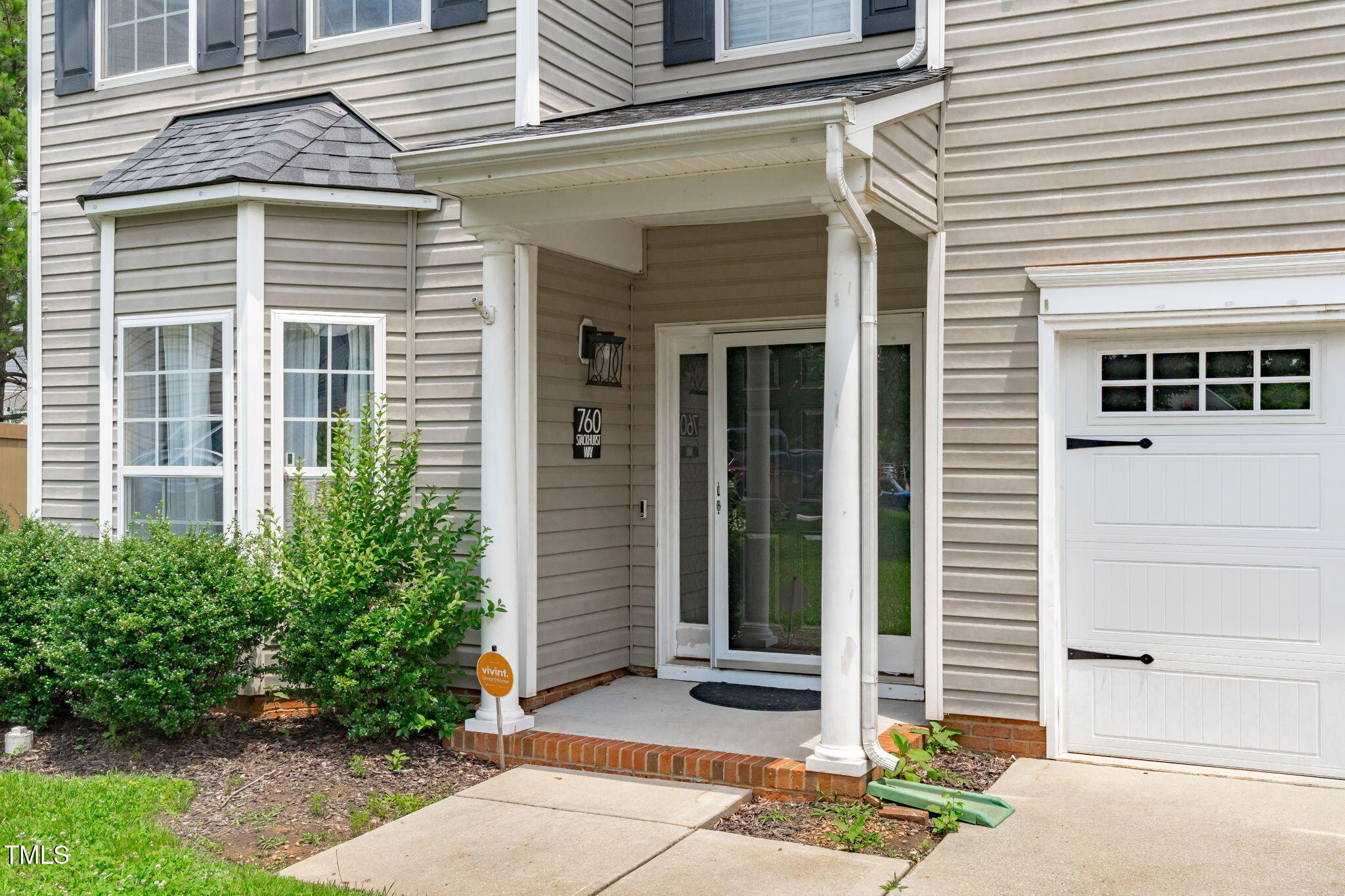 760 Stackhurst Way Wake Forest, NC 27587 - Photo 6 of 37 a front view of a house with a yard