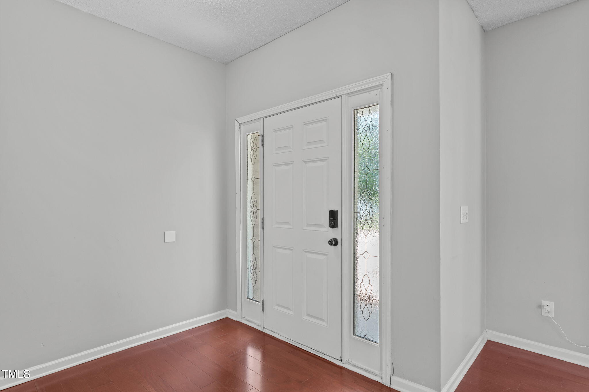 760 Stackhurst Way Wake Forest, NC 27587 - Photo 7 of 37 a view of empty room with wooden floor