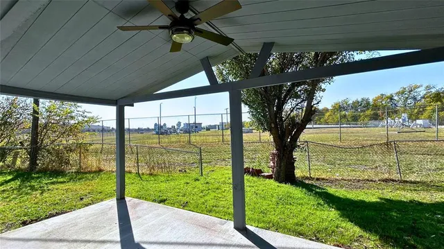 a view of outdoor space with a swimming pool