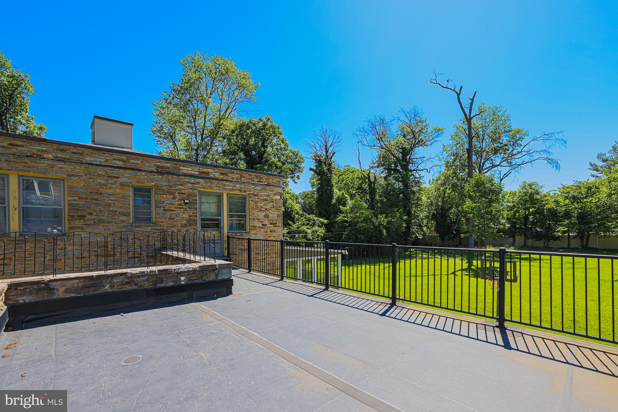 3305 Bancroft Road Baltimore, MD 21215 - Photo 59 of 61 Sunny terrace with lush green views.