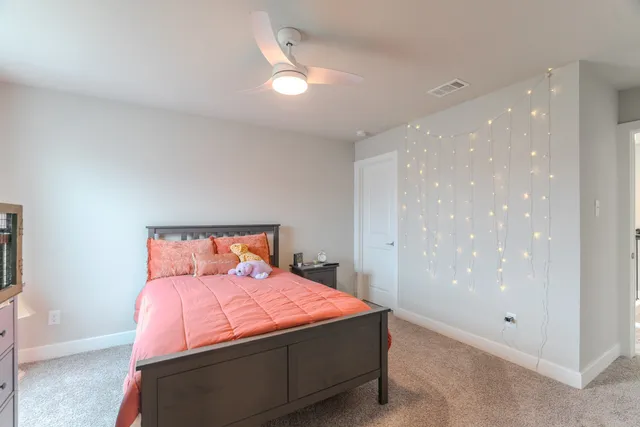 a bathroom with a sink a mirror and a toilet