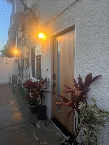 a view of balcony with potted plants