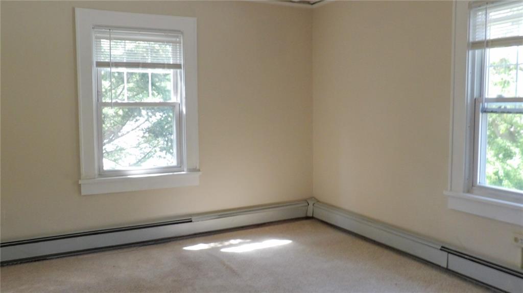 887 Quarry Place Sharon, PA 16146 - Photo 9 of 15 an empty room with a window