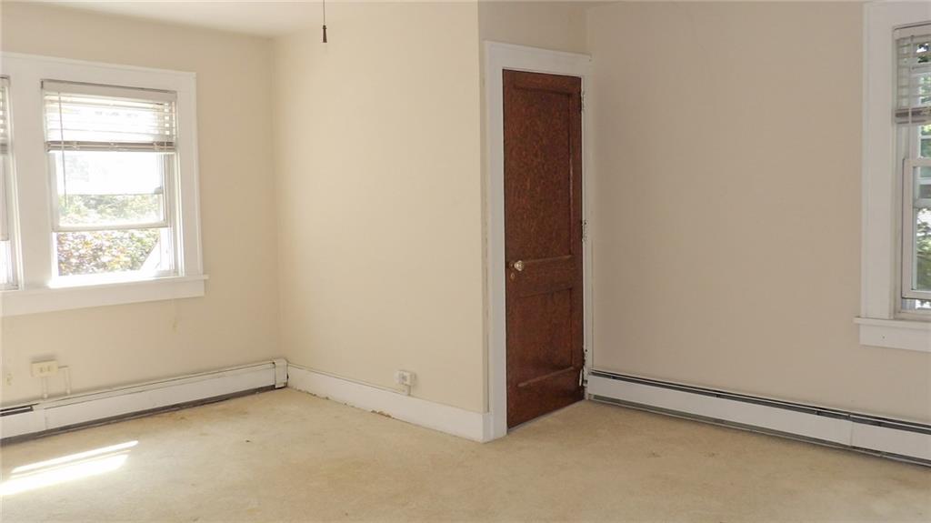 887 Quarry Place Sharon, PA 16146 - Photo 10 of 15 an empty room with windows