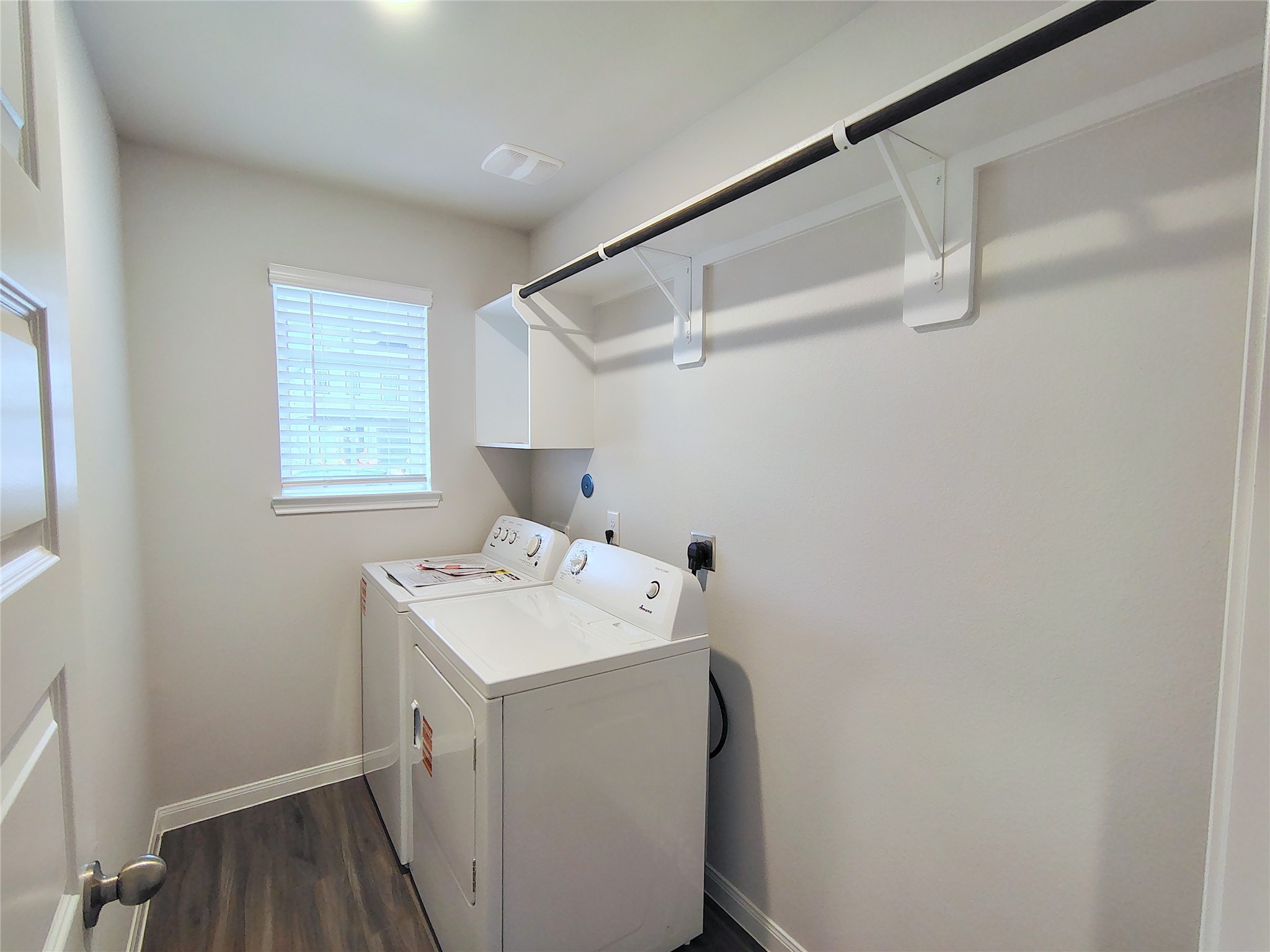 13232 Musky Drive Conroe, TX 77384 - Photo 18 of 18 a utility room with dryer and washer