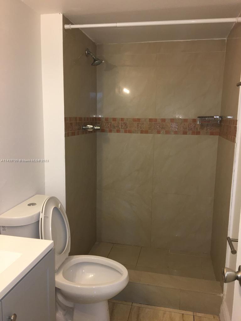 498 Northwest 165th Street, Unit D205 Miami, FL 33169 - Photo 11 of 18