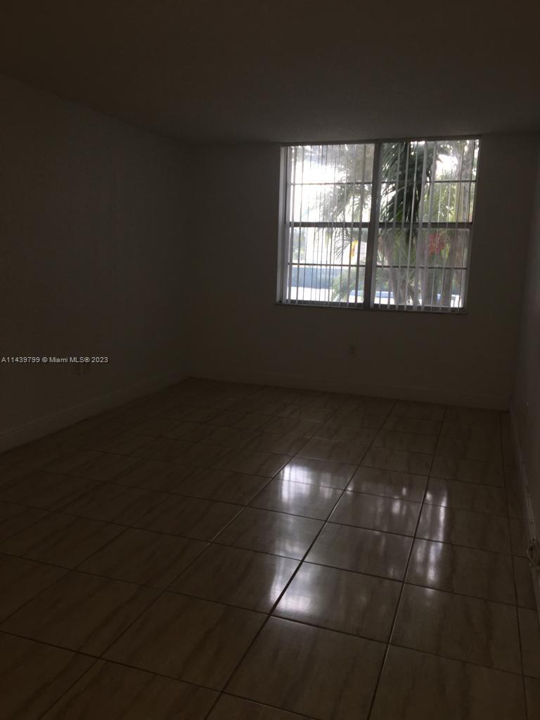 498 Northwest 165th Street, Unit D205 Miami, FL 33169 - Photo 14 of 18