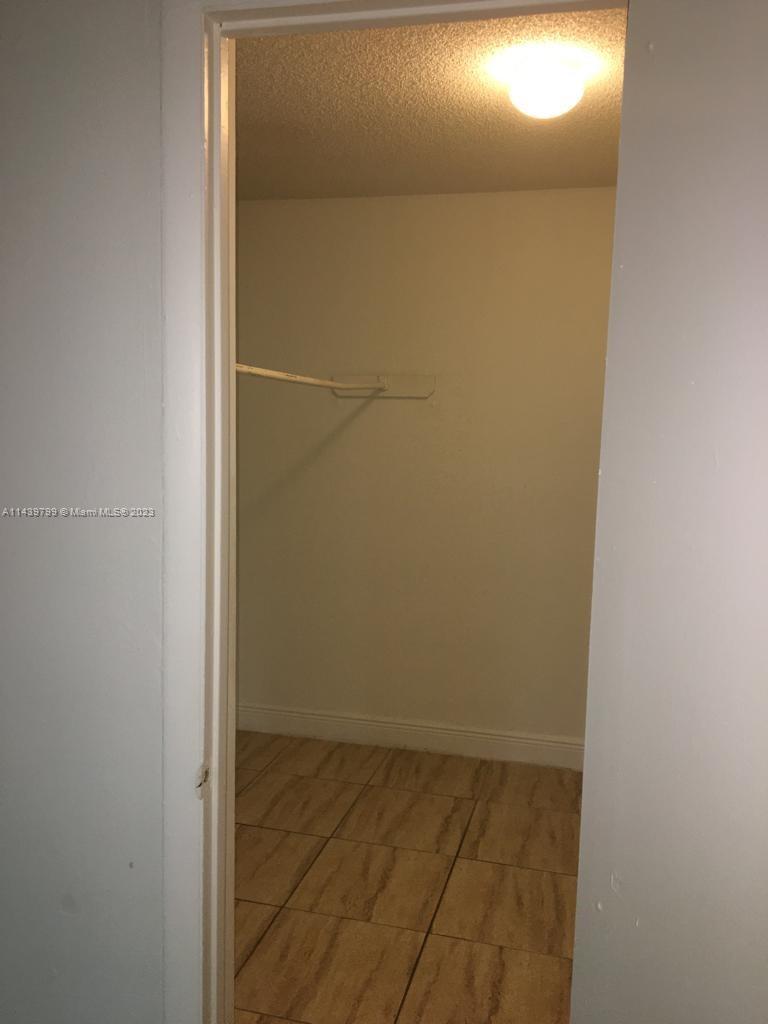 498 Northwest 165th Street, Unit D205 Miami, FL 33169 - Photo 15 of 18
